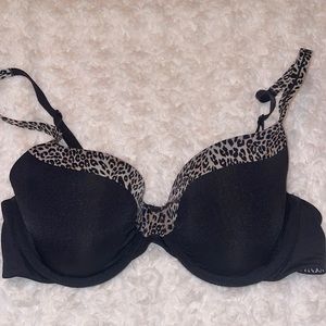 Victoria’s Secret lined demi bra. Color: Black with leopard print. Size: 36C.
